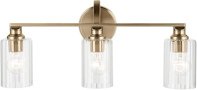 Kichler Gioe 24.25" 3-Light Vanity Light with Clear Fluted Glass in Champagne Bronze, Damp Rated, for Bathroom, Powder Room, Over a Mirror, (24.25" W x 10.5" H), 55226CPZFLU