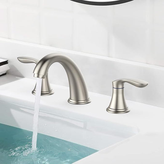Bathroom sink with a silver faucet and running water