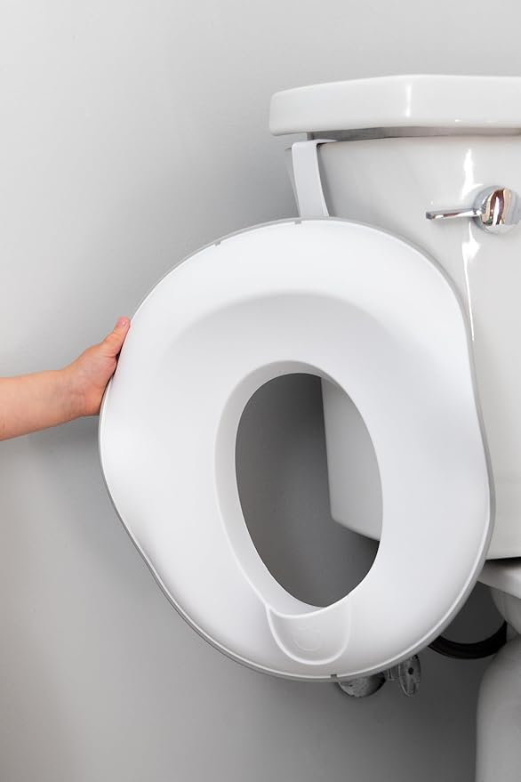 Ubbi Adjustable Toilet Trainer for Toddlers in Potty Training with Built-in Handles and Bonus Potty Hook for Easy Storage, Gray