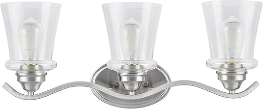 Aspen Creative 62117-1, Three-Light Metal Bathroom Vanity Wall Light Fixture, 24" Wide, Transitional Design in Satin Nickel with Clear Glass Shade