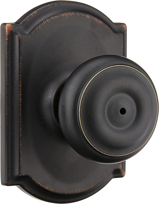 Schlage F40 GEO 716 CAM Georgian Door Knob with Camelot Trim, Bed & Bath Privacy Lock, Aged Bronze