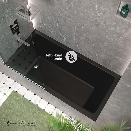 Black bathtub with left-hand drain label on a tiled bathroom floor, featuring Swiss Madison branding.