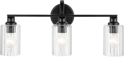 Kichler Gioe 24.25" 3-Light Vanity Light with Clear Fluted Glass in Black, Damp Rated, for Bathroom, Powder Room, Over a Mirror, (24.25" W x 10.5" H), 55226BKFLU