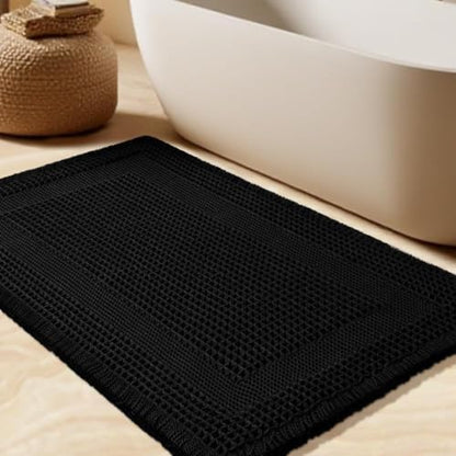 Upgrade Waffle Bath Mat, Boho Bathroom Rugs Absorbent Non Slip, Ultra Soft Bathroom Mat, Machine Washable Knit Bath Rugs with Tassels for Bathroom, Bedroom, Kitchen, Shower, Tub, Black, 36"x24"
