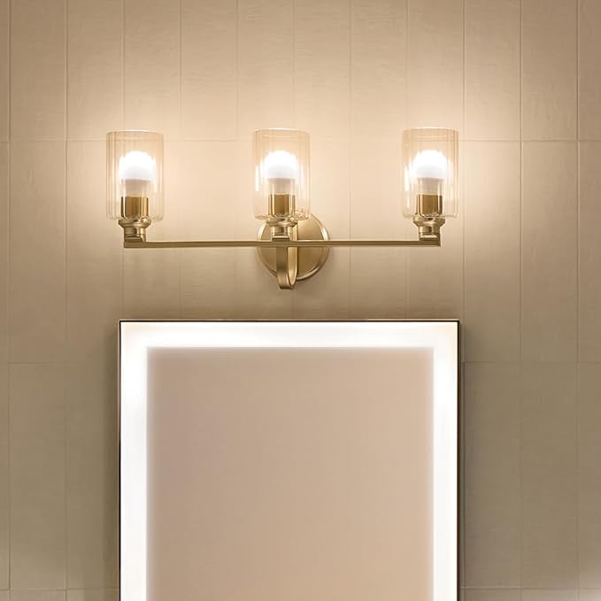 Kichler Gioe 24.25" 3-Light Vanity Light with Clear Fluted Glass in Champagne Bronze, Damp Rated, for Bathroom, Powder Room, Over a Mirror, (24.25" W x 10.5" H), 55226CPZFLU