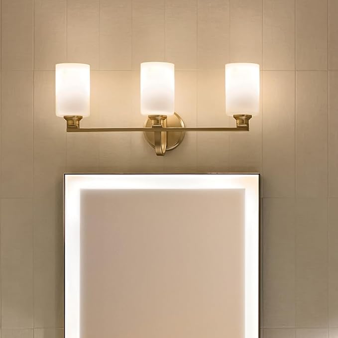 Kichler Gioe 24.25" 3-Light Vanity Light with Opal Glass in Champagne Bronze, Damp Rated, for Bathroom, Powder Room, Over a Mirror, (24.25" W x 10.5" H), 55226CPZ