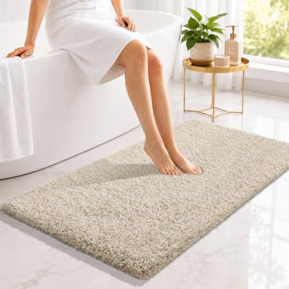 Yimobra Fluffy Plush Bath Rug, Shaggy Soft Comfortable Non Slip, Water Absorbent Microfiber Bath Mat, Dry Quick, Machine Washable Thick Bathroom Floor Rugs for Shower, 44" X 24", Light Beige and White