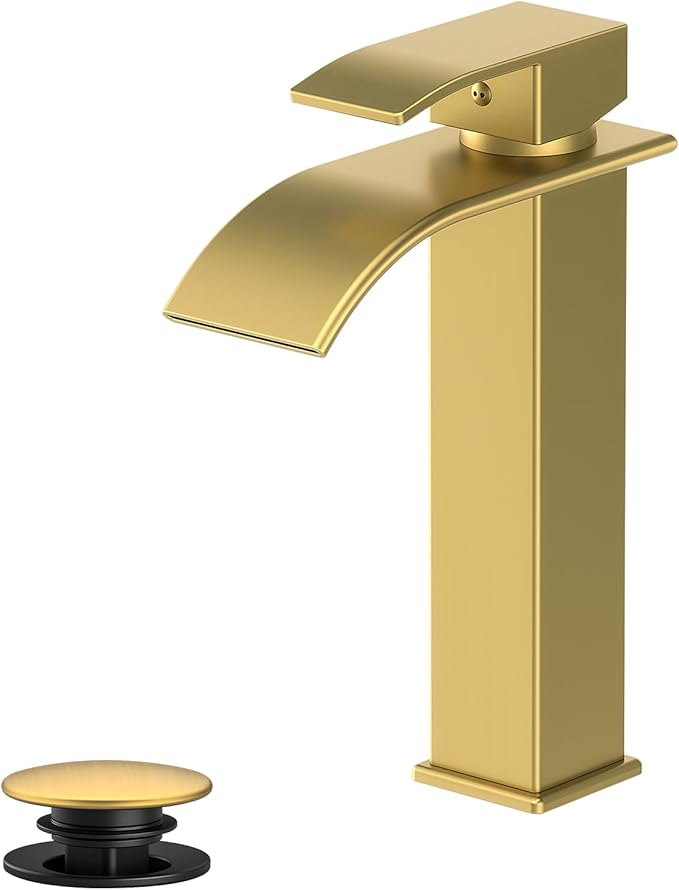 Gold faucet with black handle on a white background