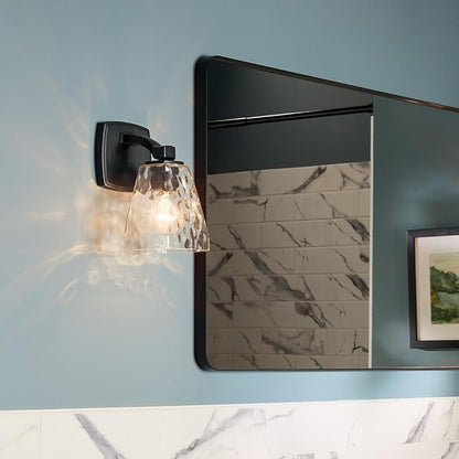 Kichler Marant 5" 1-Light Wall Sconce with Clear Water Glass in Black, for Bathroom, Powder Room, Hallways, (5" W x 9.5" H), 55214BKWTR