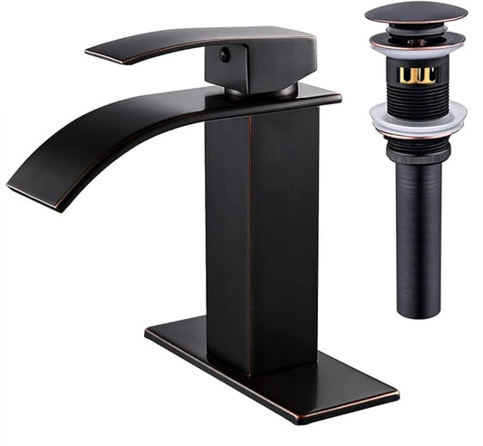 Black bathroom faucet with drain assembly on a white background