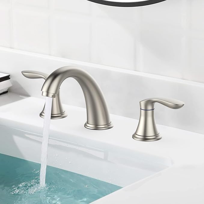 Bathroom sink with a silver faucet and running water