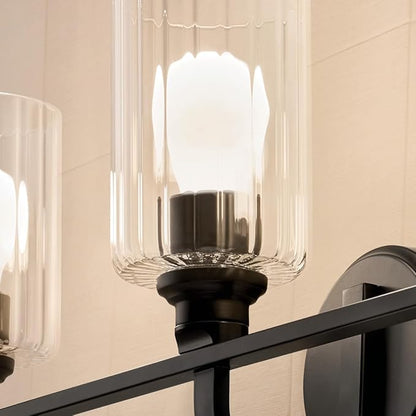 Kichler Gioe 24.25" 3-Light Vanity Light with Clear Fluted Glass in Black, Damp Rated, for Bathroom, Powder Room, Over a Mirror, (24.25" W x 10.5" H), 55226BKFLU