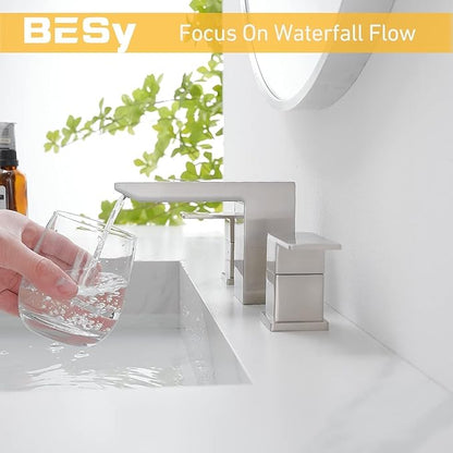 BESV faucet with a glass of water on a white countertop, featuring the brand name.