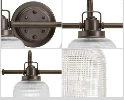 Progress Lighting Archie Collection 4-Light Clear Double Prismatic Glass Coastal Bath Vanity Light Venetian Bronze