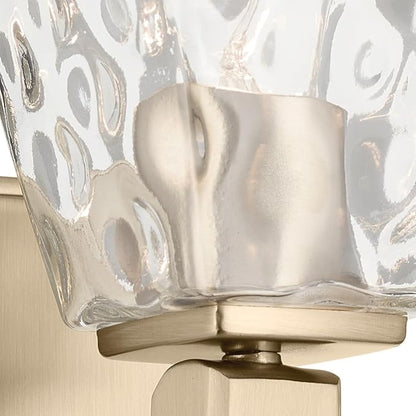 Kichler Marant 5" 1-Light Wall Sconce with Clear Water Glass in Champagne Bronze, for Bathroom, Powder Room and Hallway, (5" W x 9.5" H), 55214CPZWTR