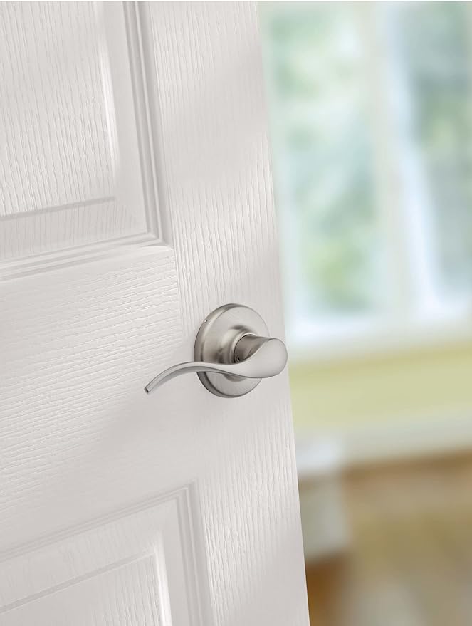 Kwikset Balboa Interior Passage Door Handle, Lever for Closet and Hallway Doors, Reversible Non-Locking Handle Lever, Antique Brass, with Microban Protection