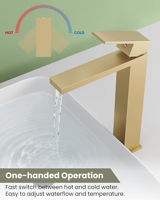 Gold faucet with water flowing into a sink, labeled for hot and cold water.