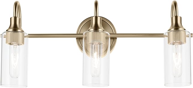 Kichler Kavi 23" 3-Light Vanity Light with Clear Glass in Champagne Bronze, Damp Rated, for Bathroom, Powder Room, Over a Mirror, (23" W x 10" H), 55211CPZ