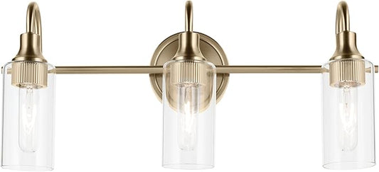 Kichler Kavi 23" 3-Light Vanity Light with Clear Glass in Champagne Bronze, Damp Rated, for Bathroom, Powder Room, Over a Mirror, (23" W x 10" H), 55211CPZ