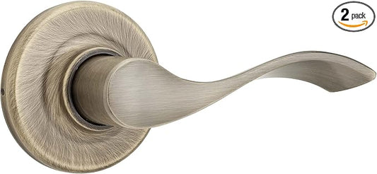 Kwikset Balboa Interior Passage Door Handle, Lever for Closet and Hallway Doors, Reversible Non-Locking Handle Lever, Antique Brass, with Microban Protection