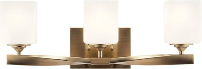 Kichler Marette 23 inch 3 Light Vanity Light with Satin Etched Cased Opal Glass in Champagne Bronze for Bathroom and Powder Room, (23" W x 8.25" H x 6" Ext), 55002CPZ