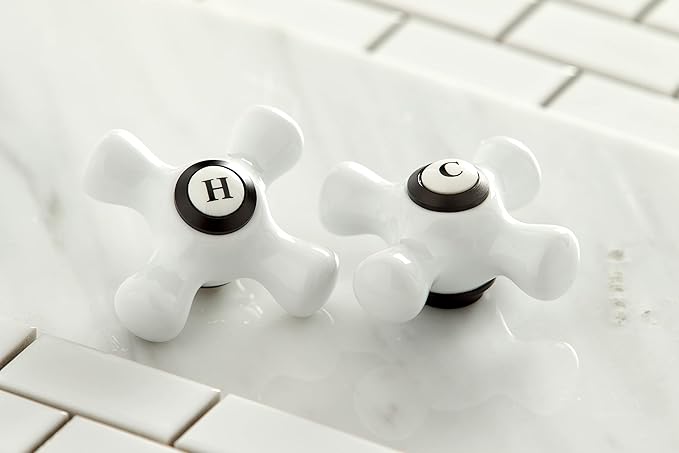 Kingston Brass KB1605PX Heritage 4-Inch Centerset Lavatory Faucet with Porcelain Cross Handle, Oil Rubbed Bronze , Oil-Rubbed Bronze