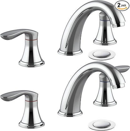 Set of four chrome bathroom faucets on a white background