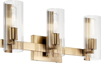 Kichler Jemsa 3 Light Vanity, Modern Light with Clear Fluted Glass in Champagne Bronze for Bathroom or Powder Room (9.75" x 22.75"), 55168CPZ