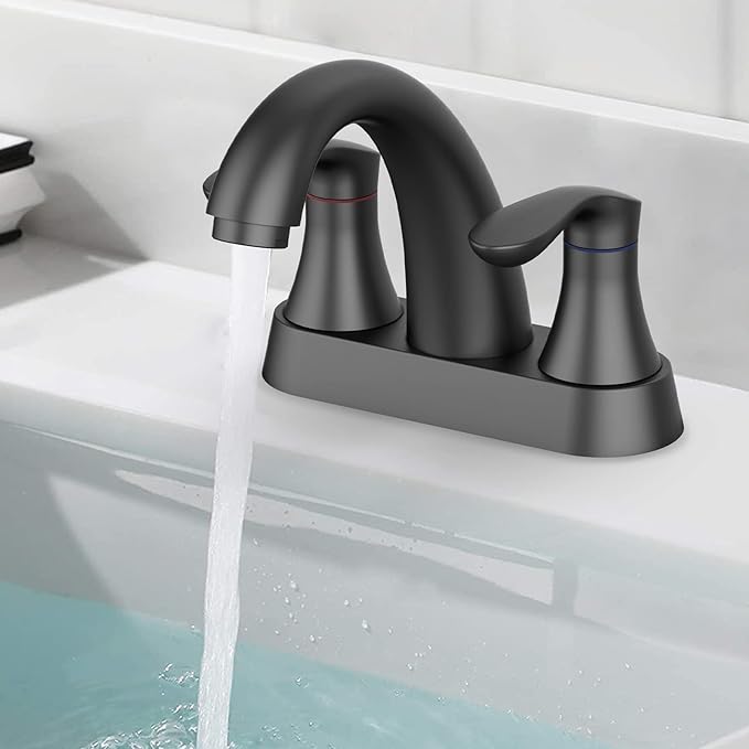 Black faucet with water flowing into a bathtub