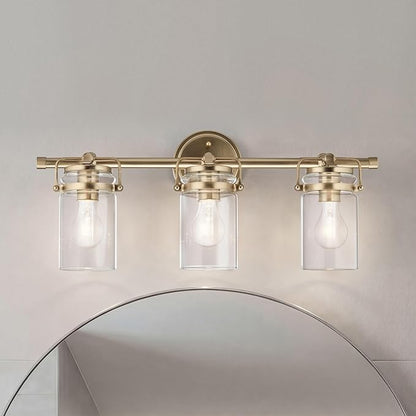 Kichler, Brinley 24" 3 Light Vanity Light with Clear Glass in Champagne Bronze for Bathroom and Powder Room, (24" W x 10.25" H), 45689CPZ