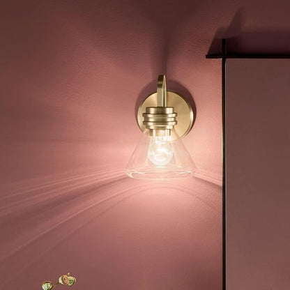 Kichler Farum 7.25" 1-Light Wall Sconce with Clear Glass in Champagne Bronze, for Fireplace, Kitchen, Bedroom, Hallway, or Vanity, (7.25" W x 9.5" H) 55153CPZCLR