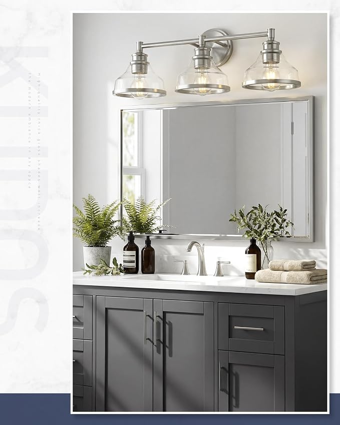 kudos 3-Light Brushed Nickel Vanity Light, Clear Glass Shade | 24" bathroom light fixtures over mirror, upward or downward, E26 base, bulbs not included, Hardwired, KDVL20-BN-3
