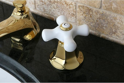 Kingston Brass KS4462PX Metropolitan Widespread Lavatory Faucet with Porcelain Cross Handle, Polished Brass