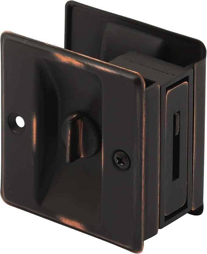 Prime-Line N 7319 Pocket Door Privacy Lock with Pull, Classic Bronze | Single Pack, Replace Old or Damaged Locks, Quick and Easy Installation