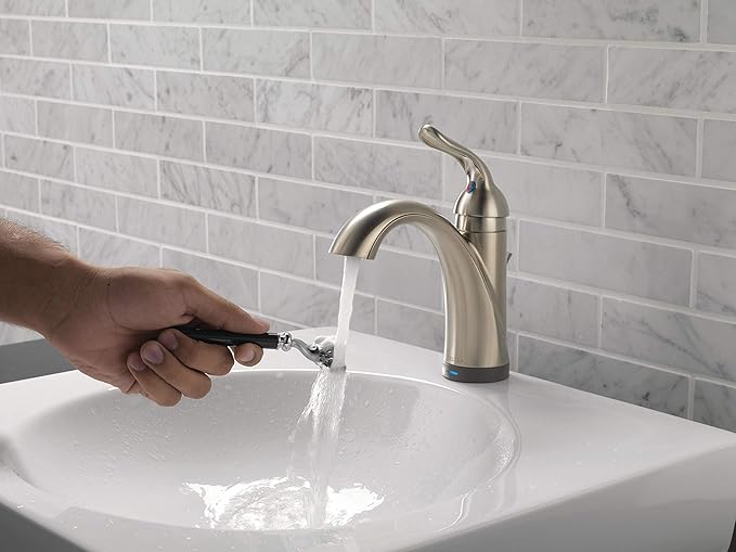 Delta Faucet Lahara Single Hole Bathroom Faucet with Touchless Technology, Brushed Nickel Bathroom Sink Faucet, Single Handle Bathroom Faucet, Bath Faucet, Push Pop-Up Drain, Stainless 538T-SS-DST