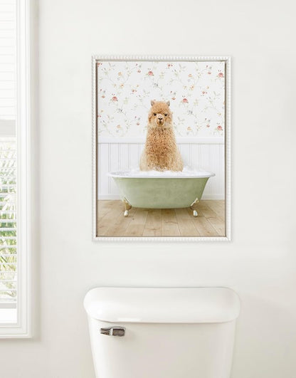 Kate and Laurel Sylvie Beaded Baby Golden Alpaca in Country Cottage Bath Vintage Framed Canvas Wall Art by Amy Peterson, 18x24 White, Modern Fun Alpaca Bathtub Wall Art for Home Décor