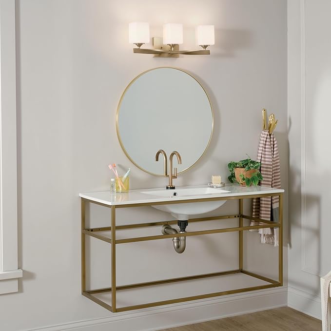 Kichler Marette 23 inch 3 Light Vanity Light with Satin Etched Cased Opal Glass in Champagne Bronze for Bathroom and Powder Room, (23" W x 8.25" H x 6" Ext), 55002CPZ