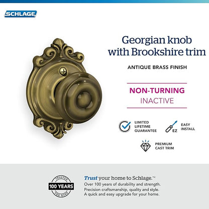 SCHLAGE Georgian Knob with Brookshire Trim Non-Turning Lock, Antique Brass (F170 GEO 609 BRK)