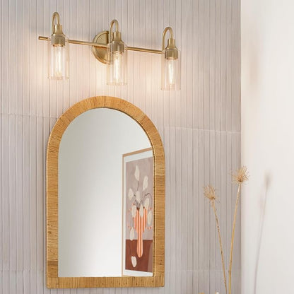 Kichler Kavi 23" 3-Light Vanity Light with Clear Glass in Champagne Bronze, Damp Rated, for Bathroom, Powder Room, Over a Mirror, (23" W x 10" H), 55211CPZ