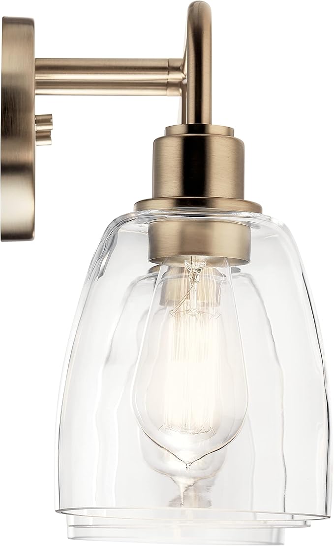 Kichler Meller 24.25 Inch 3 Light Vanity Light with Clear Glass Shades in Champagne Bronze for Bathroom or Powder Room, (24.25" W x 11.25" H x 7" D) 55102CPZ