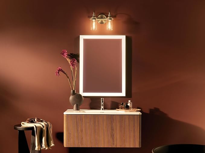 Kichler Kavi 12.5" 2-Light Vanity Light with Clear Glass in Champagne Bronze, Damp Rated, for Bathroom, Powder Room, Over a Mirror, (12.5" W x 10" H), 55210CPZ