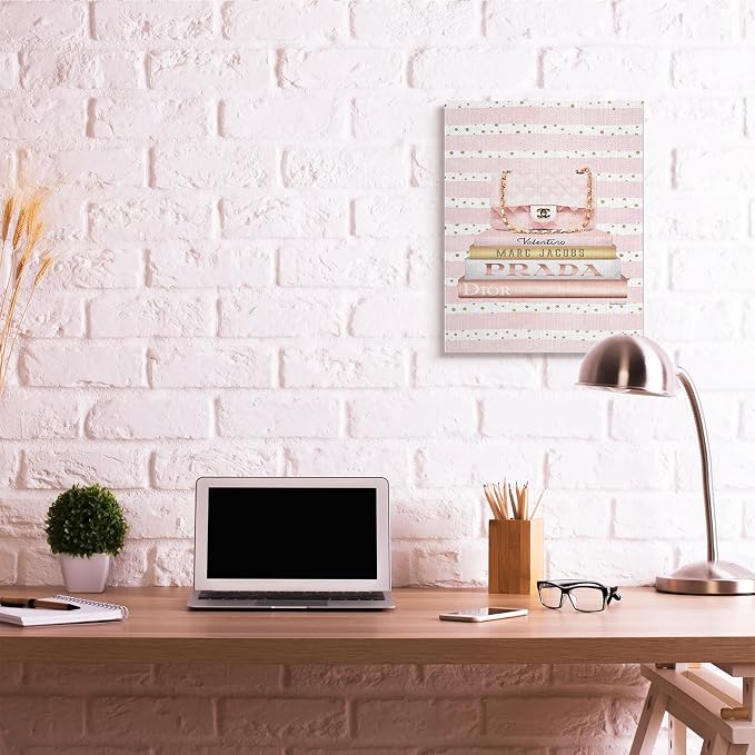 Stupell Industries 'Pink Purse Bookstack over Stripes'| Canvas Art | Stupell Industries | 24 x 30 Inches, Easy to Hang and Sturdy, Made in USA, by Amanda Greenwood