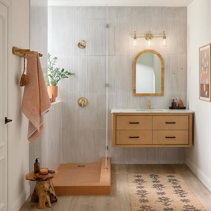 Kichler Kavi 23" 3-Light Vanity Light with Clear Glass in Champagne Bronze, Damp Rated, for Bathroom, Powder Room, Over a Mirror, (23" W x 10" H), 55211CPZ