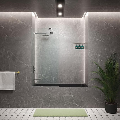 Modern bathroom with a shower enclosure, towel, bath mat, and plant.