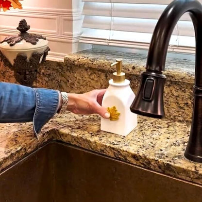 SKL Home Seasonal Soap/Lotion Dispenser Set with 7 Holiday Magnets, Gold | Interchangeable designs to celebrate all year! Gift-ready & great for the bathroom, kitchen, bar or any sink space.