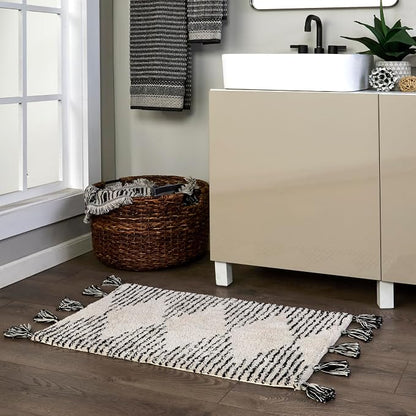 SKL Home Geo Diamond Bath Rug with Tassels, Anti-Slip, 20" x 30", Tan | 100% Cotton with Latex backing. Plush & absorbent. Modern boho design works in the bathroom, kitchen or any space.