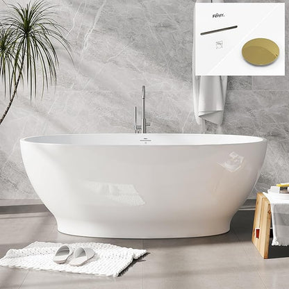 White freestanding bathtub in a modern bathroom with a gray tiled wall and a plant.