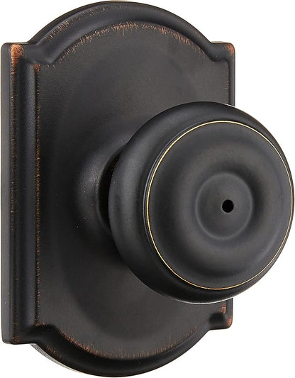 Schlage F40 GEO 716 CAM Georgian Door Knob with Camelot Trim, Bed & Bath Privacy Lock, Aged Bronze
