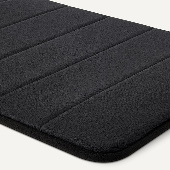 Amazon Basics Absorbent & Fast Dry Plush Memory Foam Bath Mat, 17 x 24 in, Black