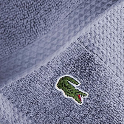 Lacoste Heritage 100% Supima Cotton Hand Towel, Light Denim, 16" x 30" – Highly Absorbent & Quick Drying, Premium Super Soft Bath Towel, Bathroom Essential, Gift for All Occasions, Machine Washable